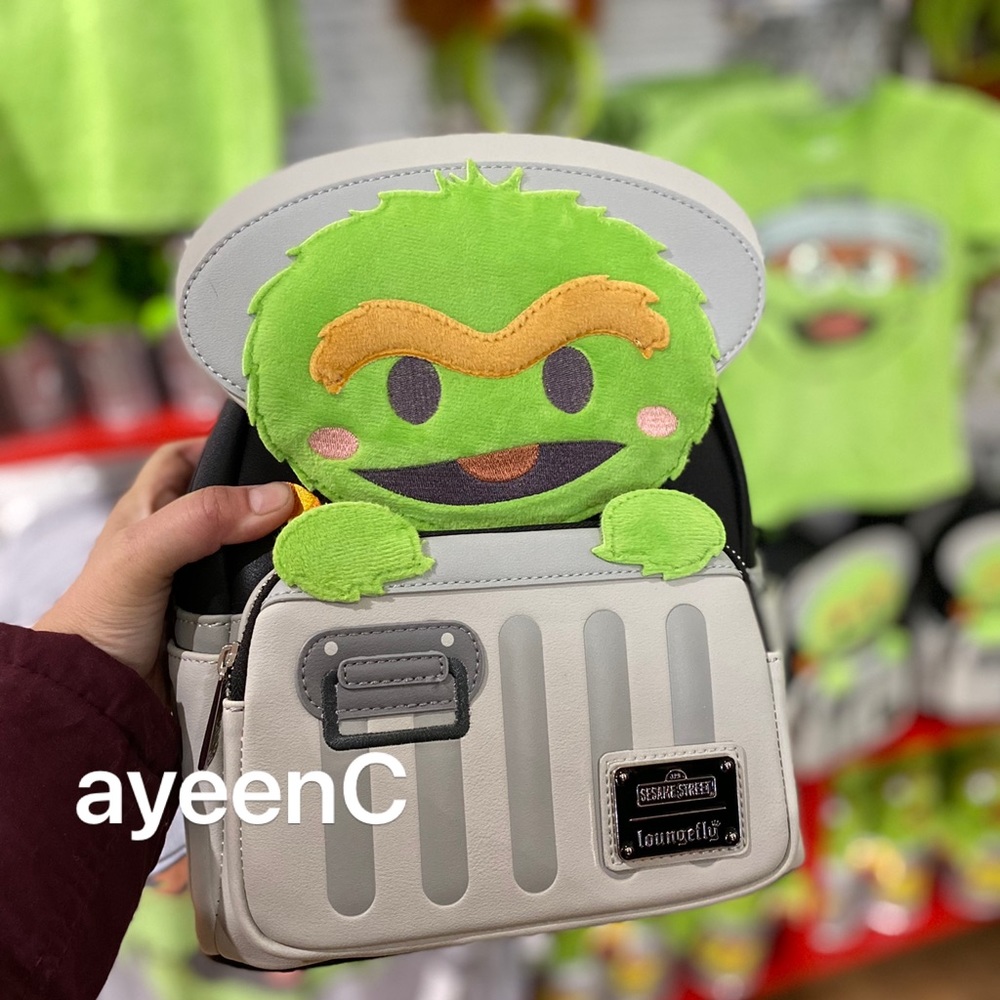 SOLD (via mercari) aireSesame Place : Oscar the Grouch Loungefly.